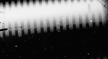 Analog black and white grunge background with film artifacts, for authentic retro film look in motion design projects