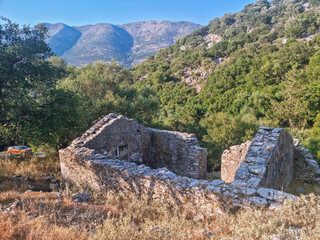 Houses ruines in Drakopoulata, abandonned village in Kefalonia after an earthquake with a panoramic...