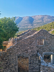 Houses ruines in Drakopoulata, abandonned village in Kefalonia after an earthquake with a panoramic...