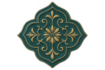 Gold quatrefoil ornament featuring intricate floral design, centered on teal surface with transparent backdrop