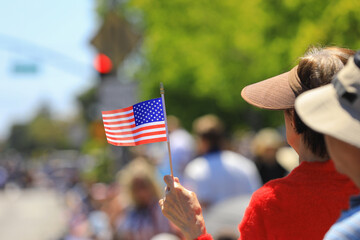American flag in People's hand