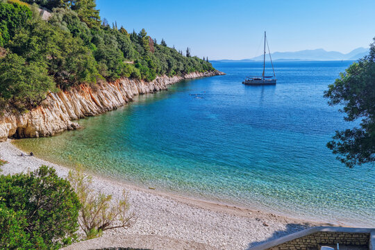 Panoramic view over Kourvoulia Beach, popular beach near Frikes and Kioni with blue turquoise waters, Ithaca island, Greece