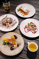 Desserts served at a trendy restaurant with elegant presentation at night