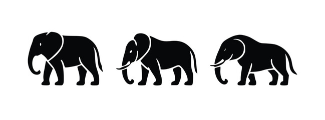 Three elephant silhouettes stand in stark black against a white background, perfect for logos or conservation projects.