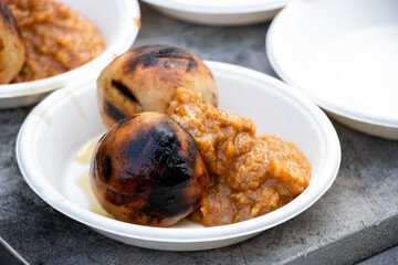 Traditional Bihari dish Litti Chokha served on a plate, showcasing authentic Indian cuisine and regional street food culture.

