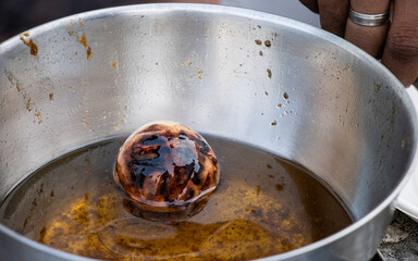 Traditional Bihari dish Litti Chokha served on a plate, showcasing authentic Indian cuisine and regional street food culture.

