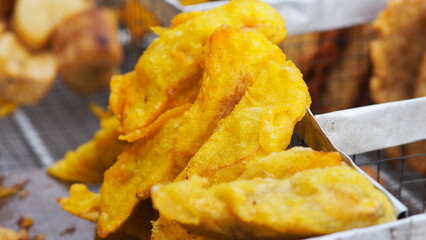 Yellow fried food called Fried Banana
