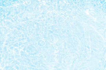 Blue water with ripples on the surface. Defocus blurred transparent blue colored clear calm water...