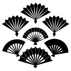 Black traditional fans arranged in a decorative pattern asian african