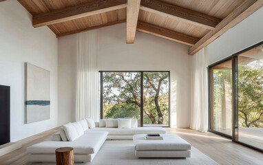 Spacious modern living room featuring large windows and natural light in a minimalist design
