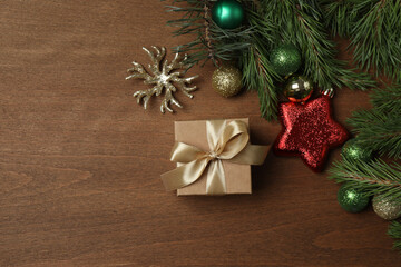 Gift boxes, New Year toys, New Year tree on wooden background