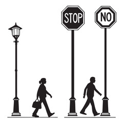 Pedestrians walking past street lamp and traffic signs silhouette