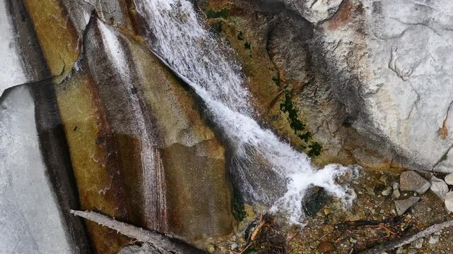 Aerial granite mountain canyon waterfall forest Utah close. Wasatch Mountain Range central Utah, outside Salt Lake City, Utah. Winter summer recreation. Landscape scenic and rugged. Cliff.