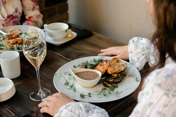 Chicken and salad brunch on wooden table