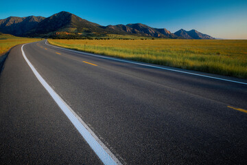 Country road leading into mountains