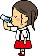水を飲む小学生女児