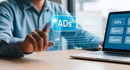 Digital marketing A focused hand clicks on Ads overlaying a laptop displaying ad panels a modern wood table and cool