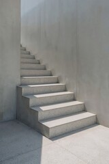 A modern concrete staircase with geometric design and minimalist architecture