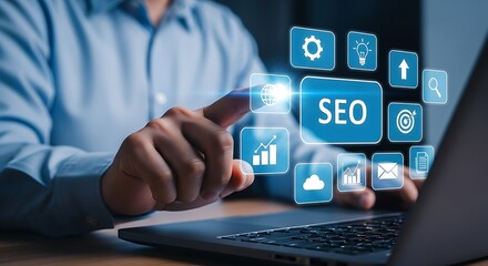 A focused fingertip hovers above a glowing SEO icon surrounded by digital icons on a silver laptop all awash in cool
