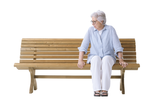 An elderly woman sitting on a bench is looking at the empty space beside her, symbolizing loneliness and grief.