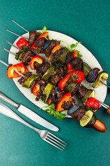 BBQ Deer Chops With Vegetable Skewers.
