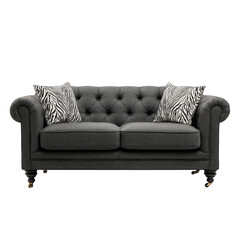 Dark gray tufted sofa with zebra print pillows