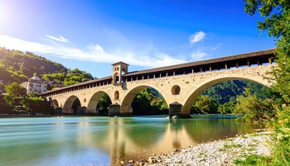 Naklejka premium Ancient stone bridge over a river