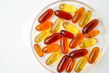 Vitamins capsules, fish oil, soft gels, supplements, omega 3, omega 9, vitamin D, vitamin E