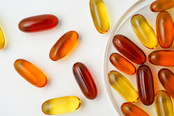 Vitamins capsules, fish oil, soft gels, supplements, omega 3, omega 9, vitamin D, vitamin E