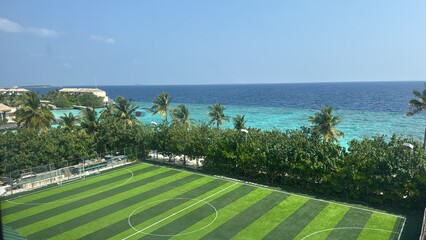 view of the sea and football ground from the resort room