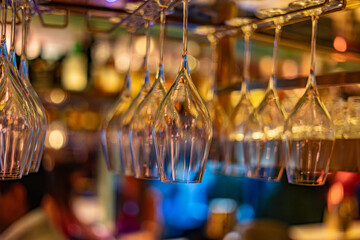 Elegant Hanging Wine Glasses at Stylish Cocktail Bar
