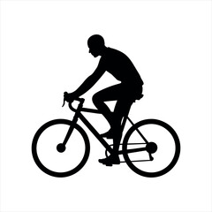 silhouette of a man riding a bicycle