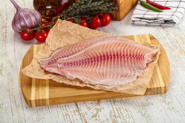 Raw Tilapia fish fillet slice