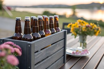 Beer crate on table with flowers and lake view for summer party celebration