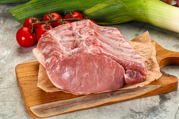 Raw pork loin cut with bone