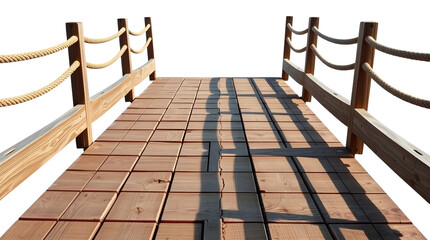 Naklejka premium Wooden bridge with rope railing extending over white background