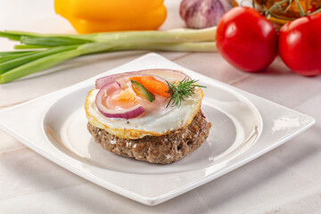 Beefsteak chop with roasted egg