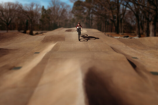Girl Riding Bike in Bike Park