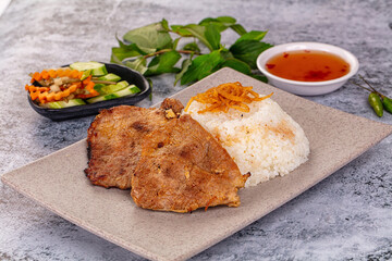 Roasted pork steak with rice