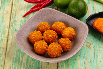 Fried crispy yellow cheese balls