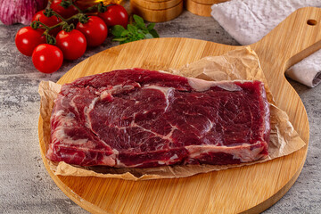 Gourmet raw rib eye steak