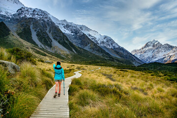Hooker valley scenery with unrecognisable hiker in Aoraki Mt Cook National Park