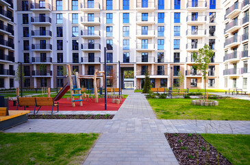 Apartment courtyard. Block house with courtyards with chairs at Walkway. Cityscape of residential...