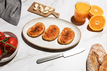 Tomato toast traditional mediterranean breakfast on kitchen countertop