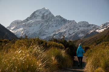 Hooker valley scenery with unrecognisable hiker in Aoraki Mt Cook National Park