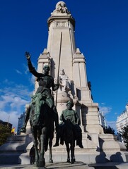 The Monument to Miguel de Cervantes is a public artwork in Madrid, Spain on the Plaza de España. It depicts Don Quixote and Sancho Panza.