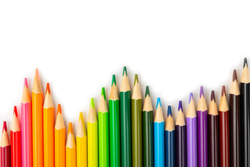 Colored pencils isolated on white background. Equipment for coloring. Stationery for...