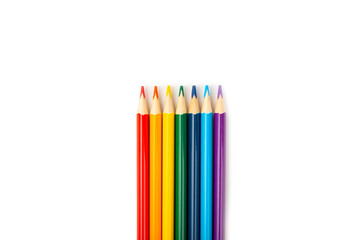 Fototapeta premium Colored pencils isolated on white background. Equipment for coloring. Stationery for creativity.Back to school. Flatlay. Children's Creativity and Education. Rainbow.