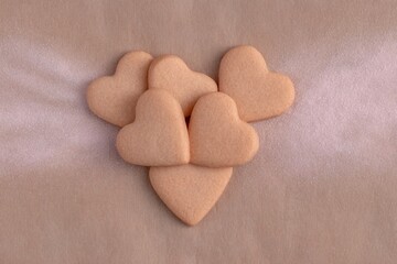 Heart-shaped cookies arranged beautifully on a soft background
