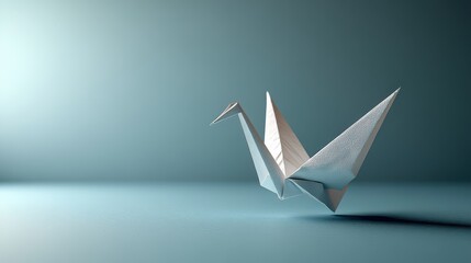 Naklejka premium Origami crane with paper bird blue background hope symbol zen art.